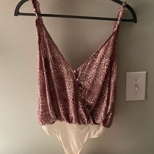 Super down cheetah print open back body suit